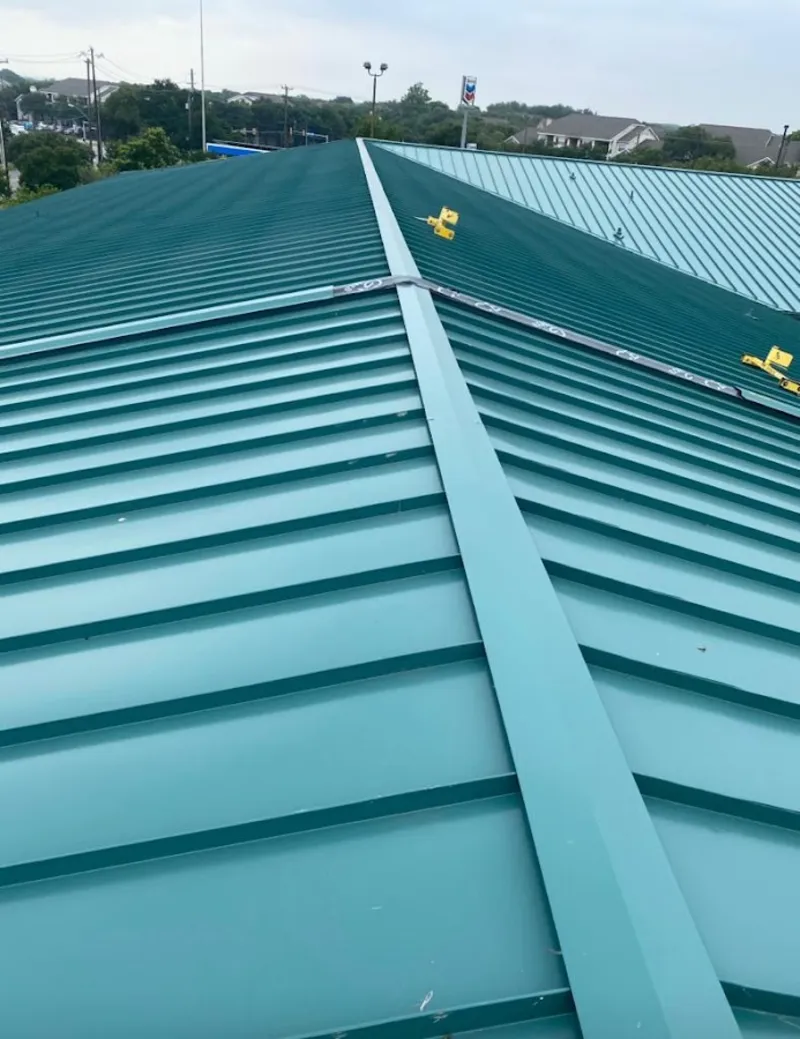Green commercial metal roof ridge and valley for Metal Roof Repair in Atwater
